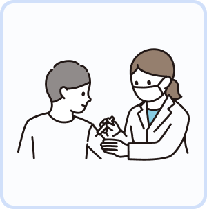 A clinician drawing blood from a seated patient